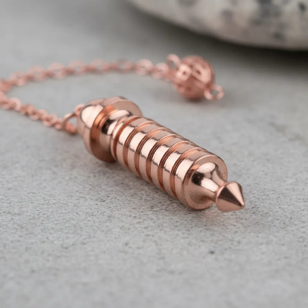 Péndulo Egipcio Oro Rosa